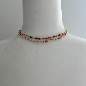 Two chokers similar colors